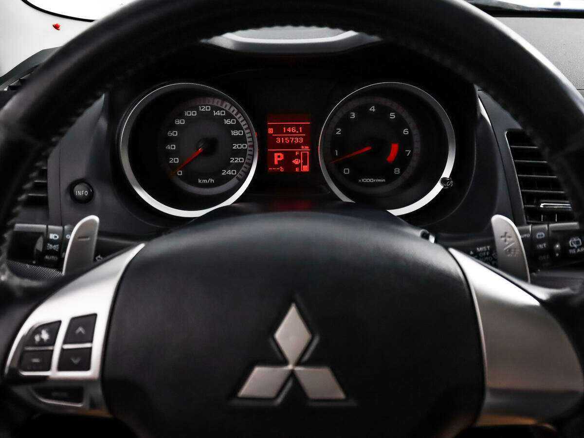 Купить Mitsubishi Lancer с пробегом. Фото: #15