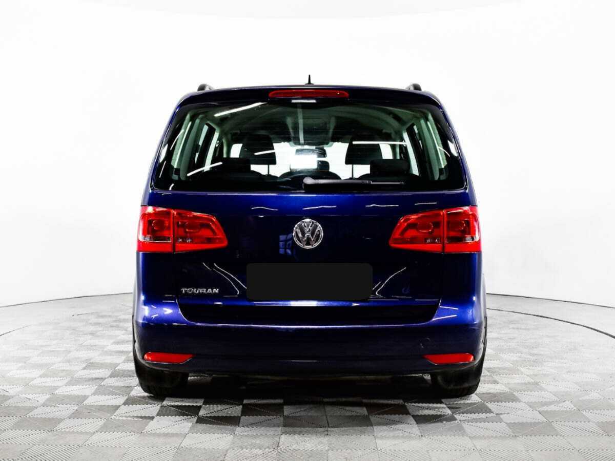 Купить Volkswagen Touran с пробегом. Фото: #5
