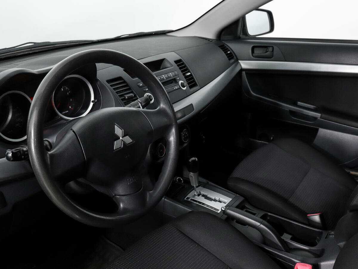 Купить Mitsubishi Lancer с пробегом. Фото: #8
