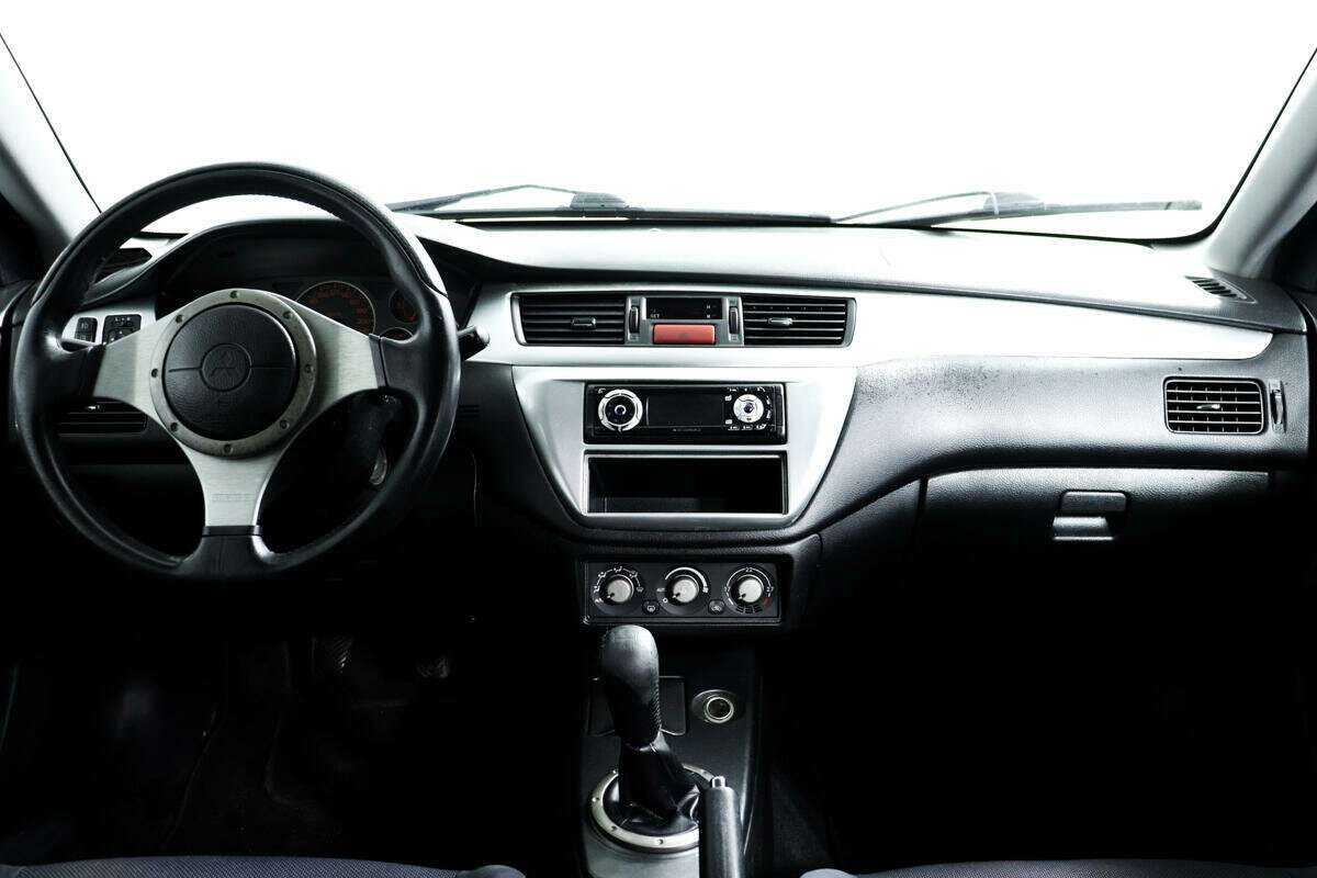 Купить Mitsubishi Lancer с пробегом. Фото: #10