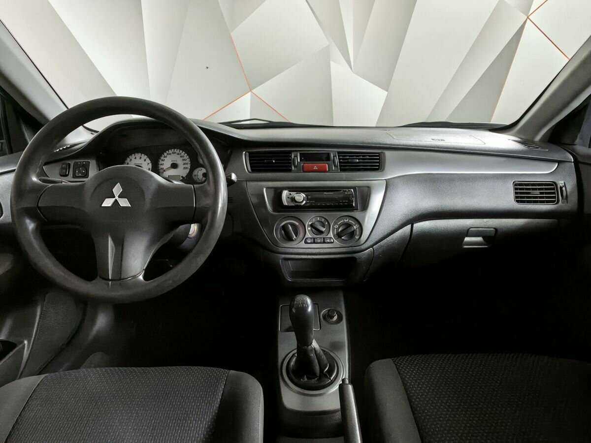 Купить Mitsubishi Lancer с пробегом. Фото: #9