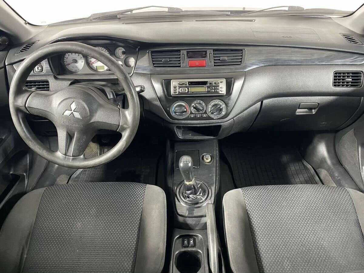 Купить Mitsubishi Lancer с пробегом. Фото: #9