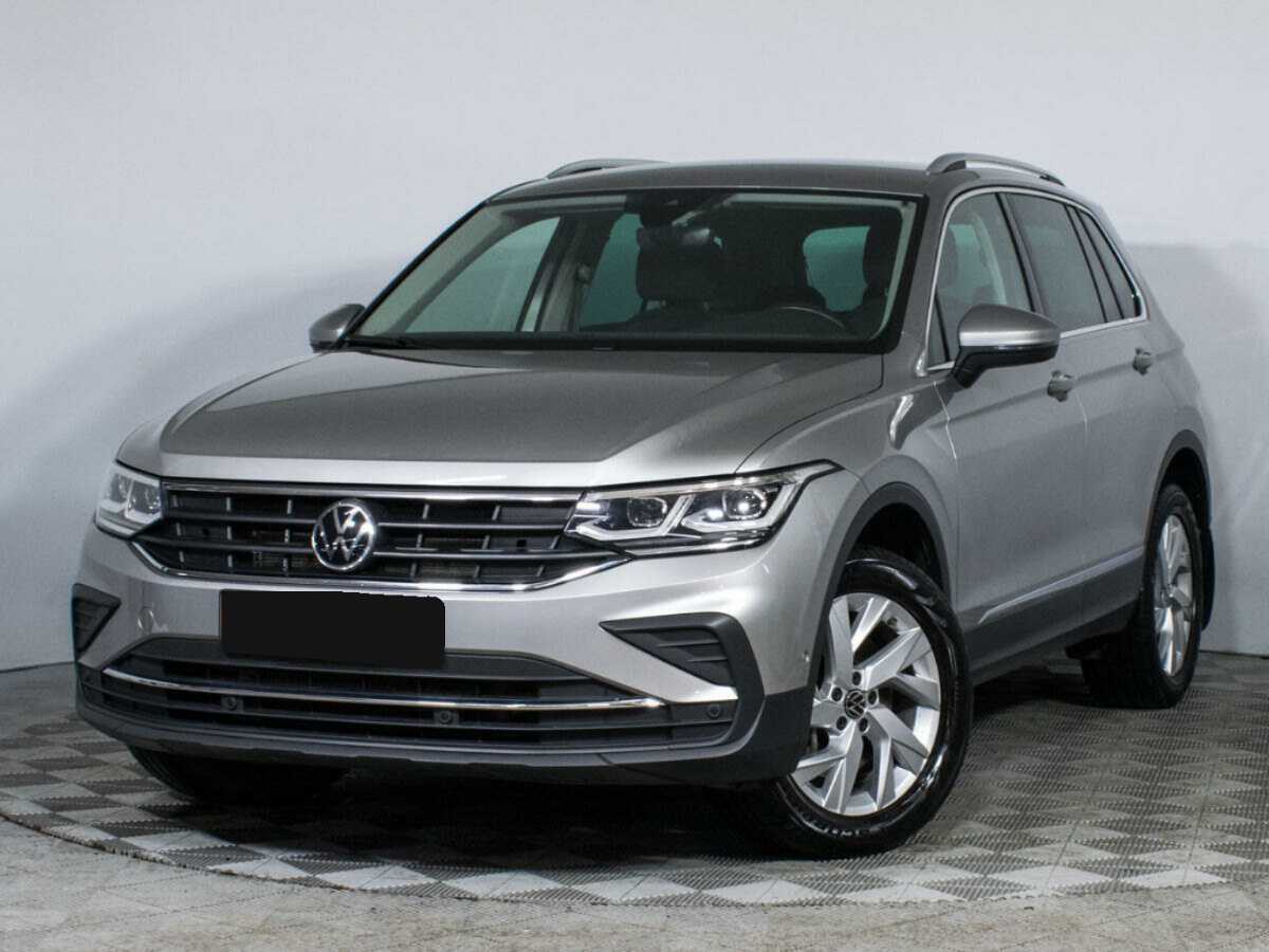 Купить Volkswagen Tiguan с пробегом. Посмотреть фото