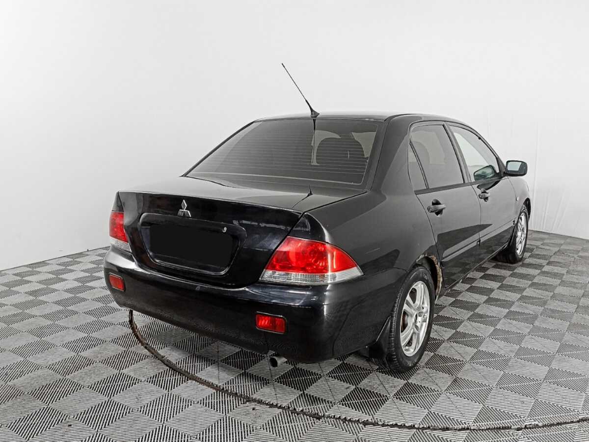 Купить Mitsubishi Lancer с пробегом. Фото: #3