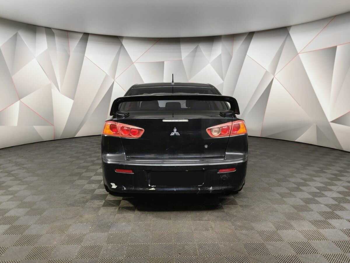 Купить Mitsubishi Lancer с пробегом. Фото: #7