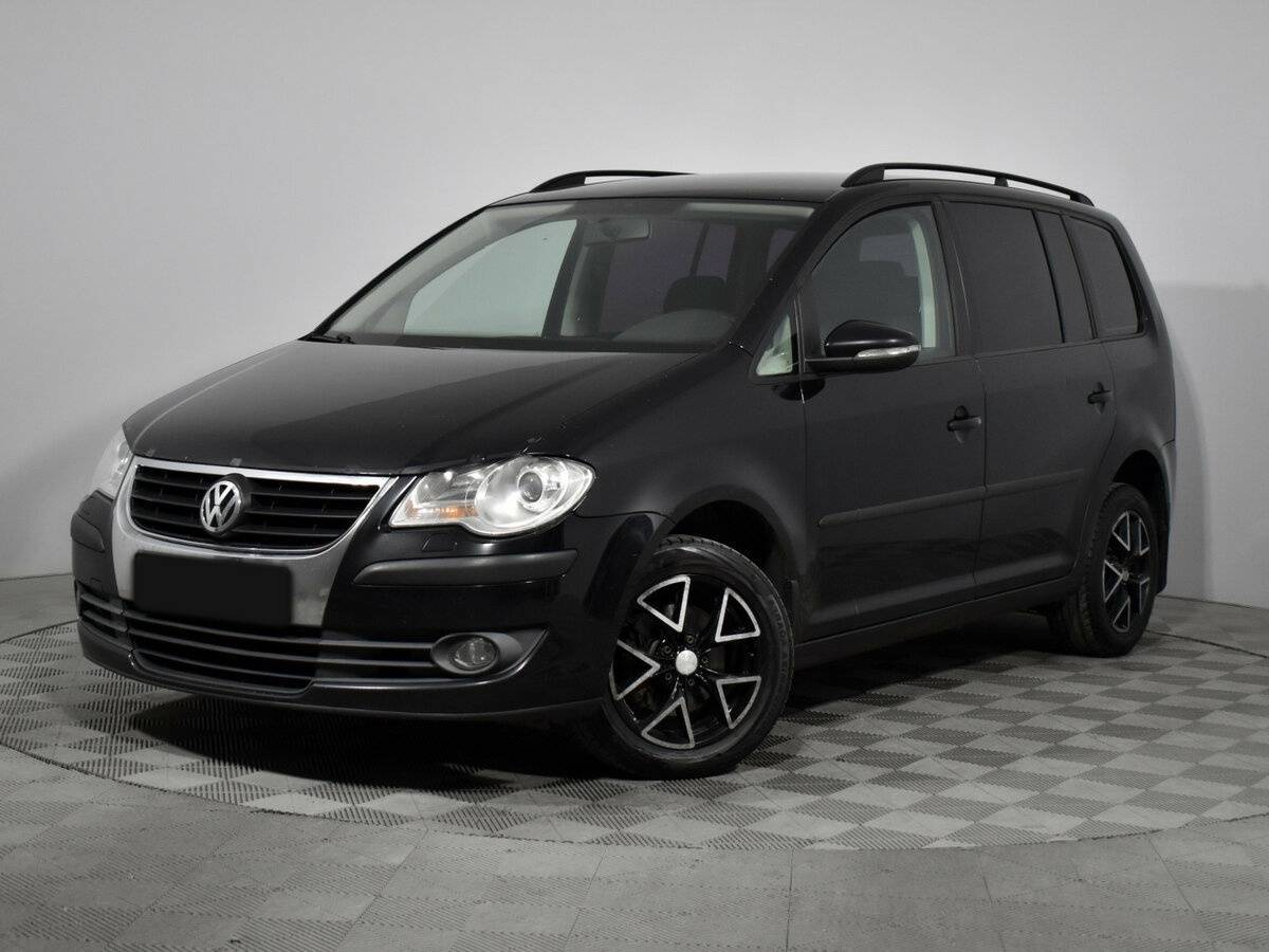 Купить Volkswagen Touran с пробегом. Посмотреть фото
