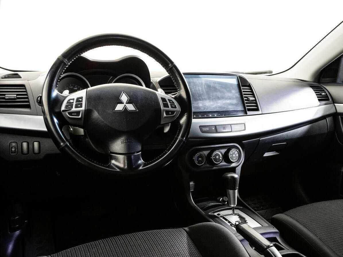 Купить Mitsubishi Lancer с пробегом. Фото: #10