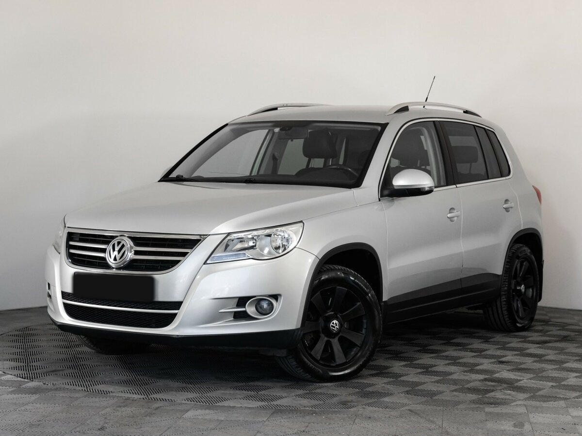 Купить Volkswagen Tiguan с пробегом. Посмотреть фото