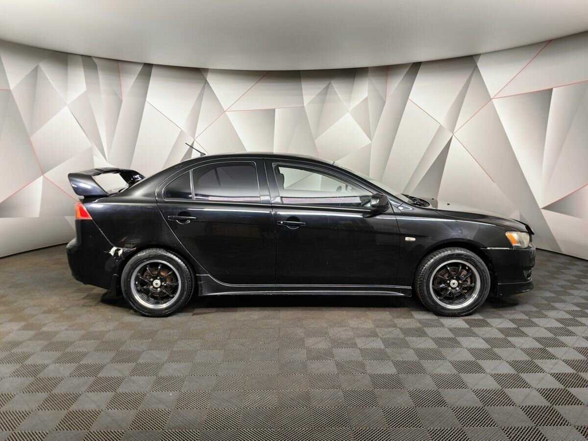 Купить Mitsubishi Lancer с пробегом. Фото: #5