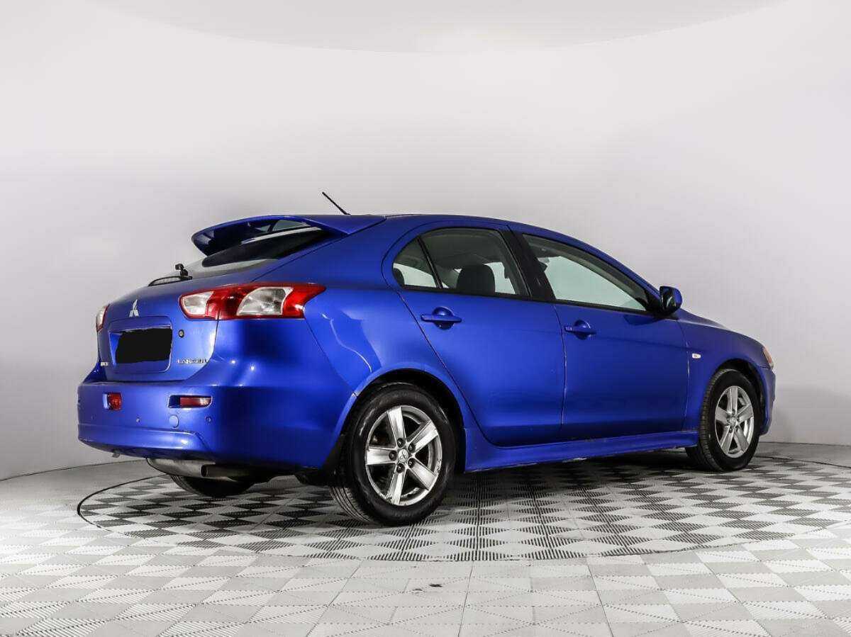 Купить Mitsubishi Lancer с пробегом. Фото: #4