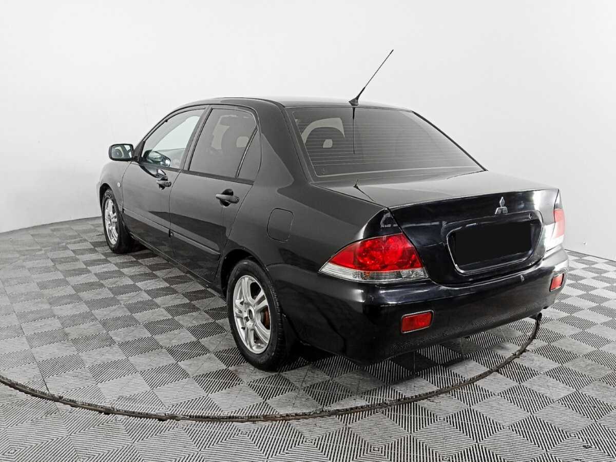 Купить Mitsubishi Lancer с пробегом. Фото: #5