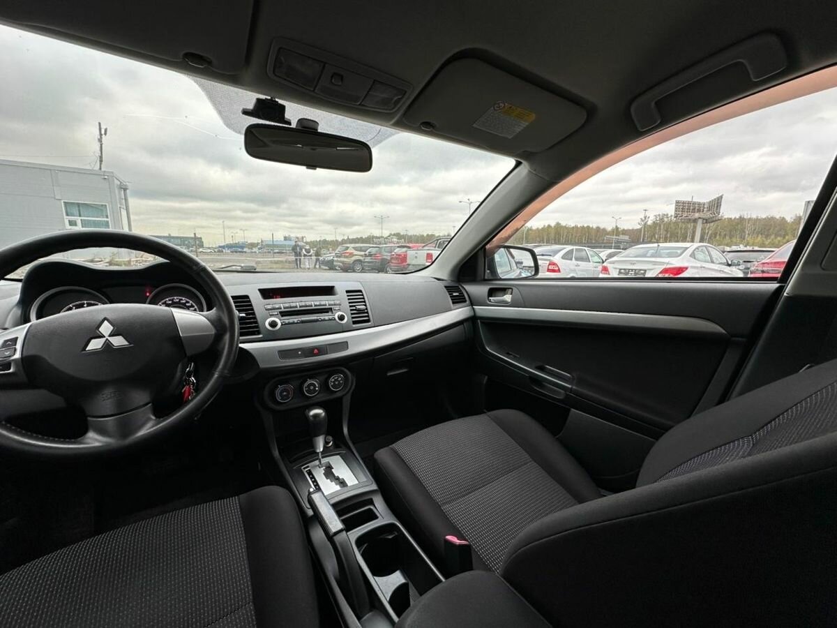Купить Mitsubishi Lancer с пробегом. Фото: #6