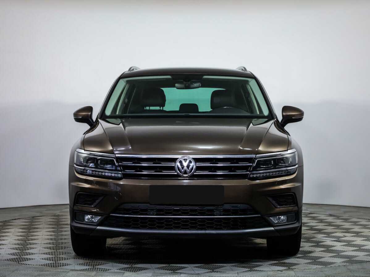 Купить Volkswagen Tiguan с пробегом. Посмотреть фото