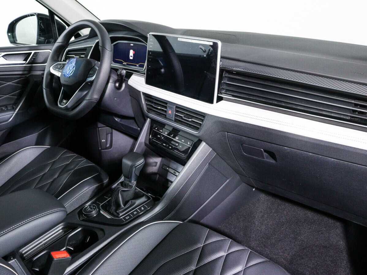Купить Volkswagen Tiguan с пробегом. Фото: #6