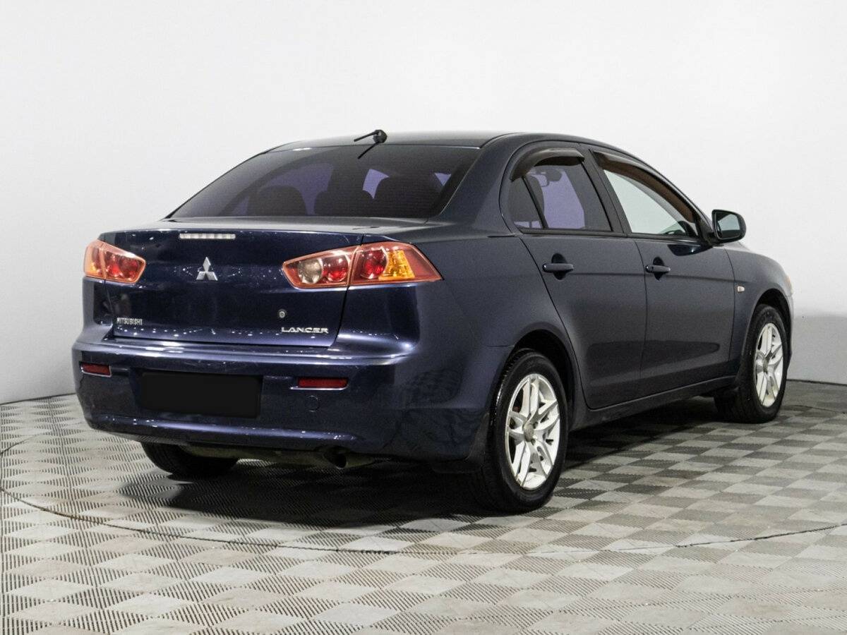 Купить Mitsubishi Lancer с пробегом. Фото: #4