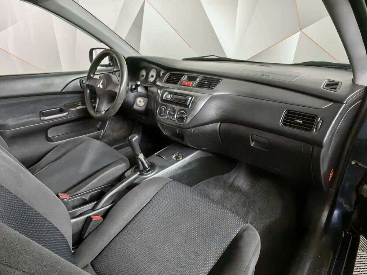 Купить Mitsubishi Lancer с пробегом. Фото: #8