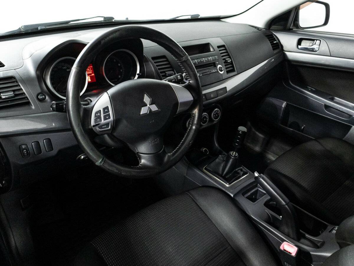 Купить Mitsubishi Lancer с пробегом. Фото: #10
