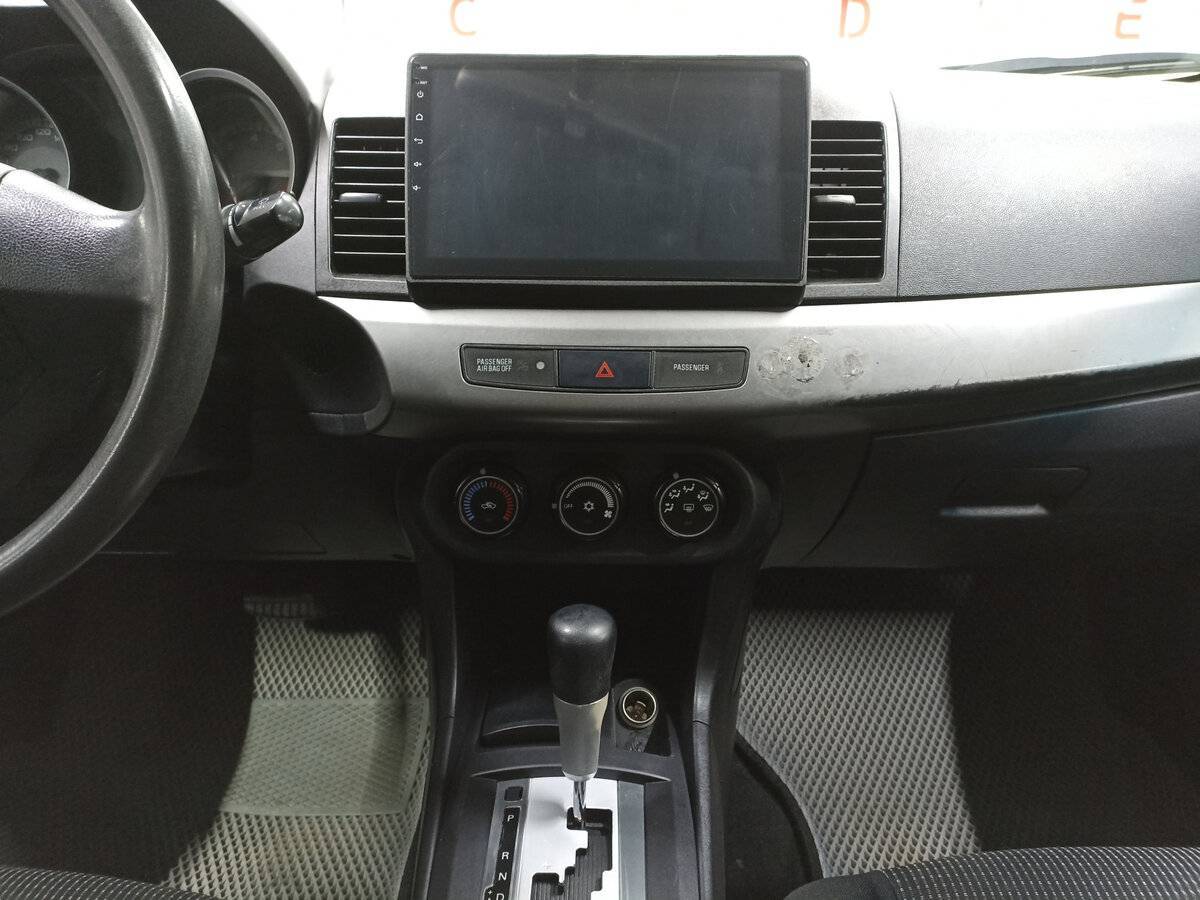 Купить Mitsubishi Lancer с пробегом. Фото: #14