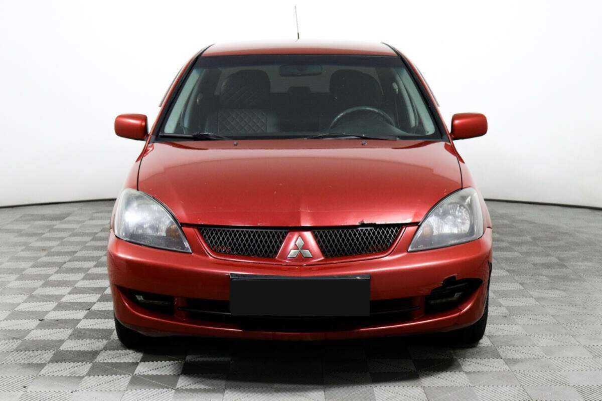 Купить Mitsubishi Lancer с пробегом. Фото: #1