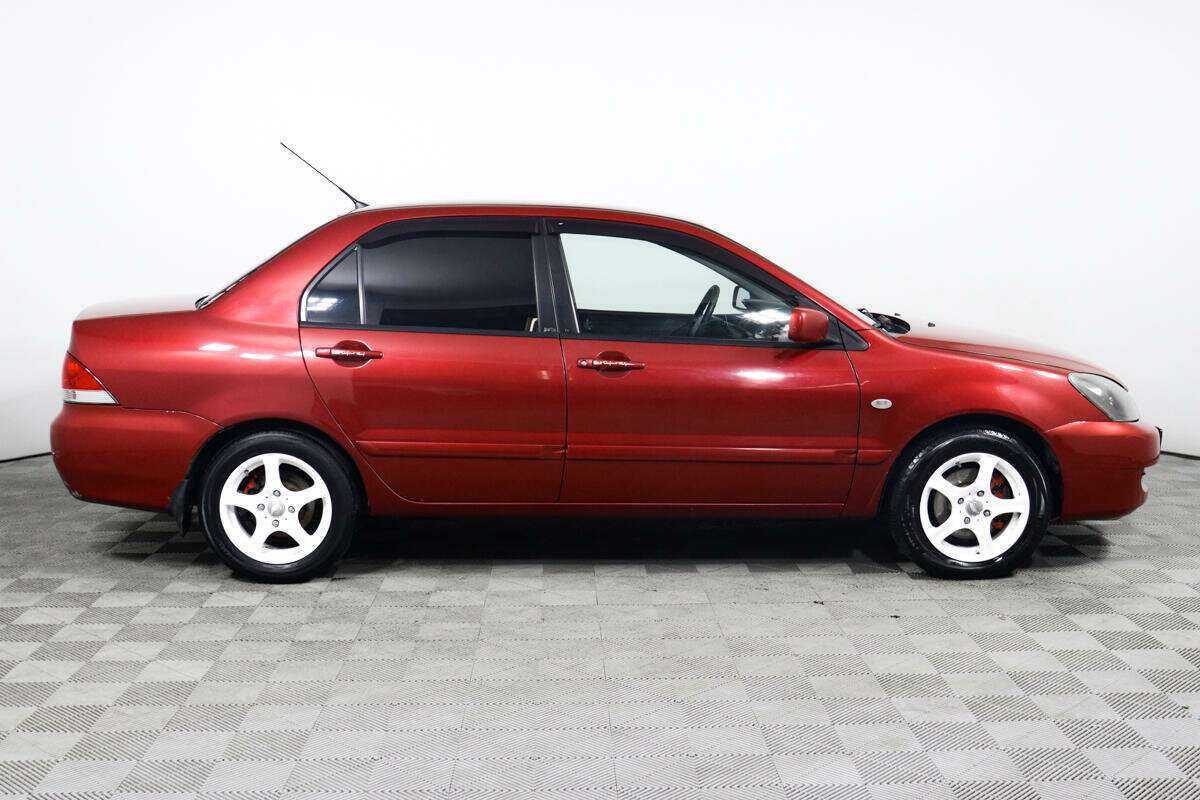 Купить Mitsubishi Lancer с пробегом. Фото: #3