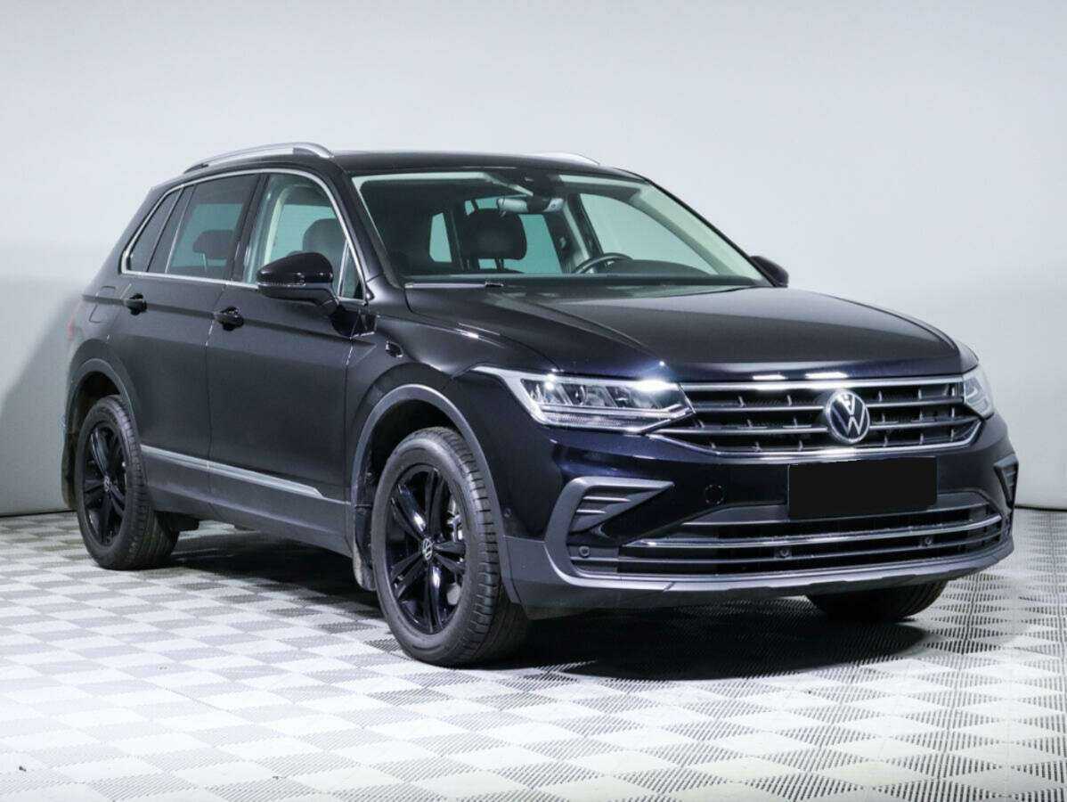 Купить Volkswagen Tiguan с пробегом. Фото: #2