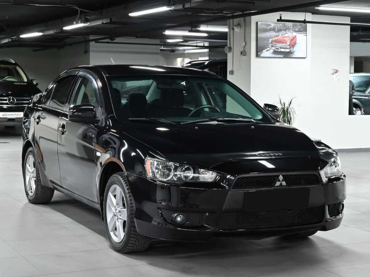Купить Mitsubishi Lancer с пробегом. Фото: #2