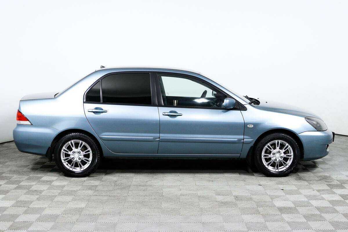 Купить Mitsubishi Lancer с пробегом. Фото: #3