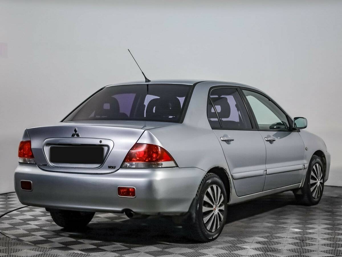 Купить Mitsubishi Lancer с пробегом. Фото: #3