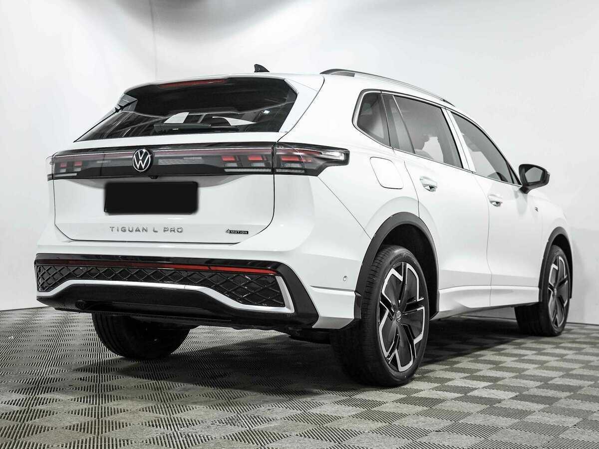 Купить Volkswagen Tiguan с пробегом. Фото: #2
