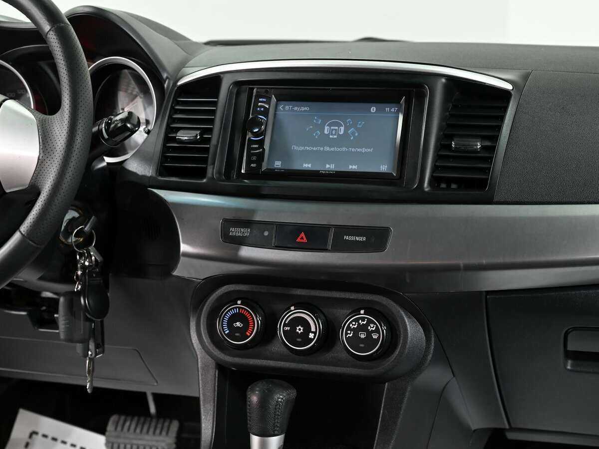 Купить Mitsubishi Lancer с пробегом. Фото: #8