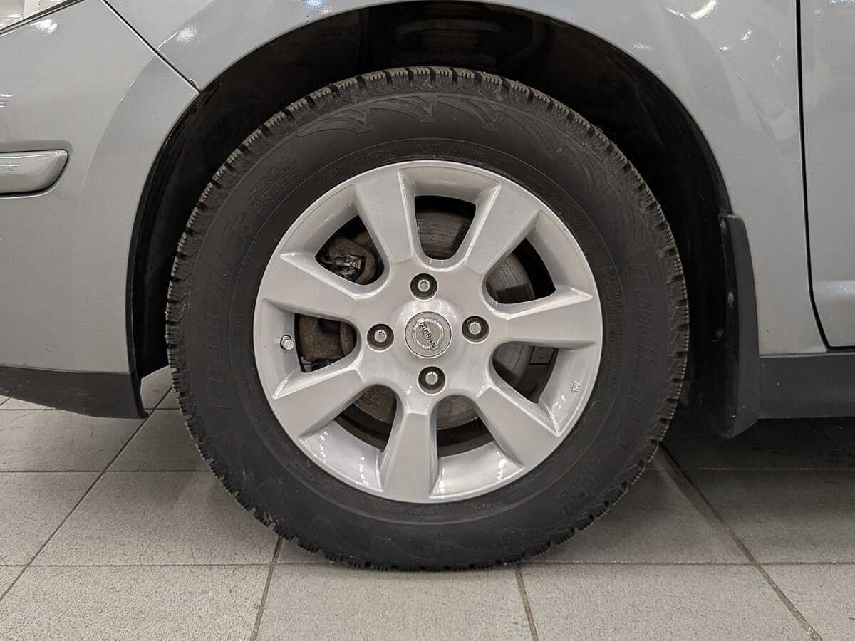 Купить Nissan Tiida с пробегом. Фото: #11