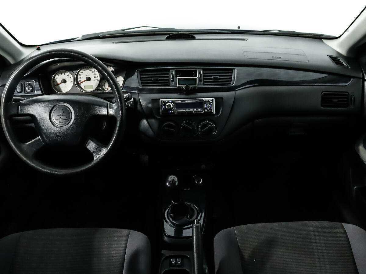 Купить Mitsubishi Lancer с пробегом. Фото: #11