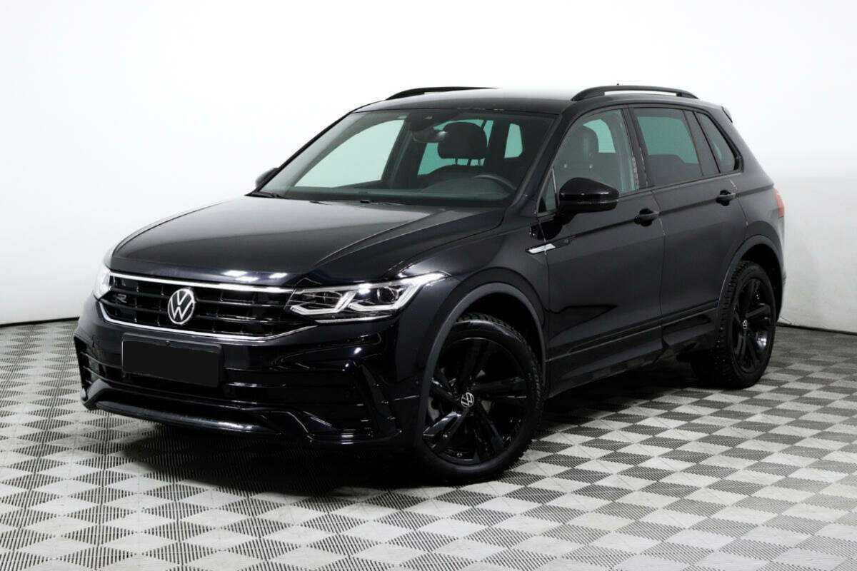 Купить Volkswagen Tiguan с пробегом. Посмотреть фото