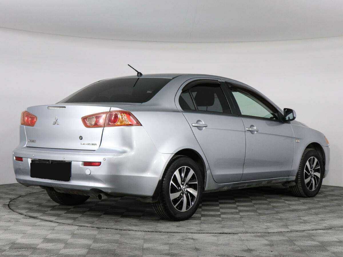 Купить Mitsubishi Lancer с пробегом. Фото: #4