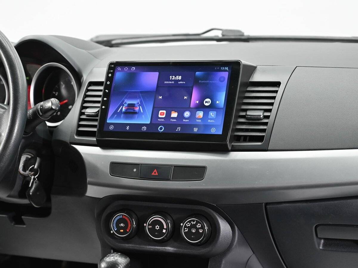 Купить Mitsubishi Lancer с пробегом. Фото: #8