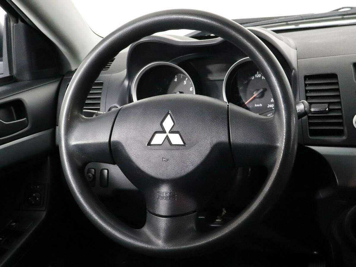 Купить Mitsubishi Lancer с пробегом. Фото: #10