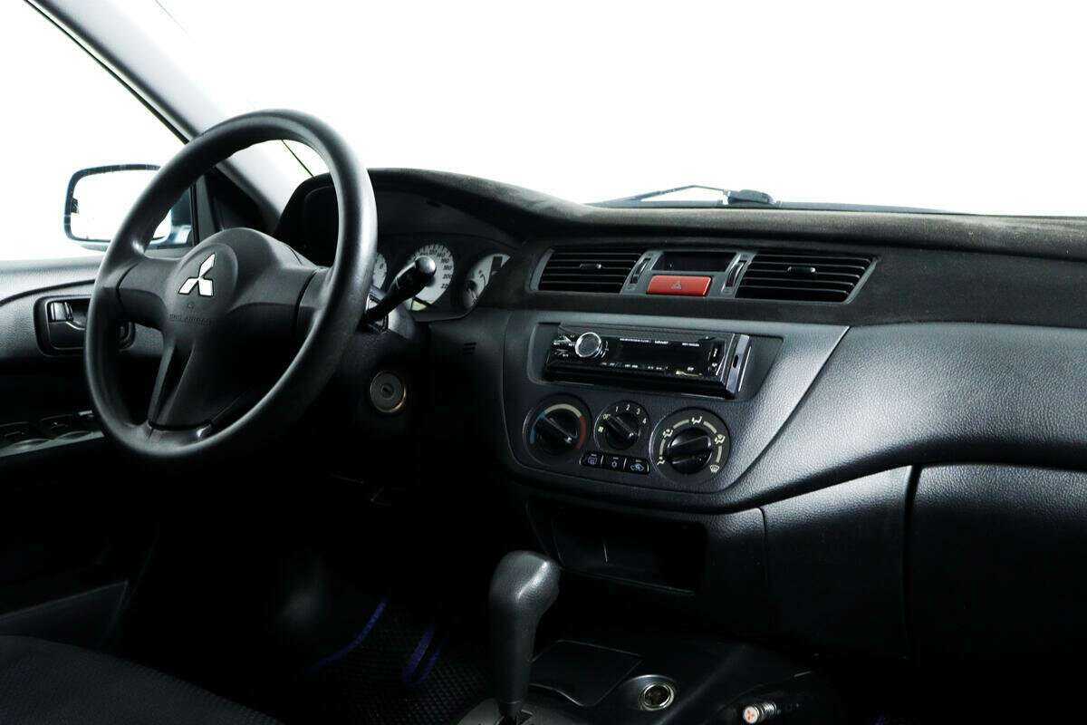 Купить Mitsubishi Lancer с пробегом. Фото: #8