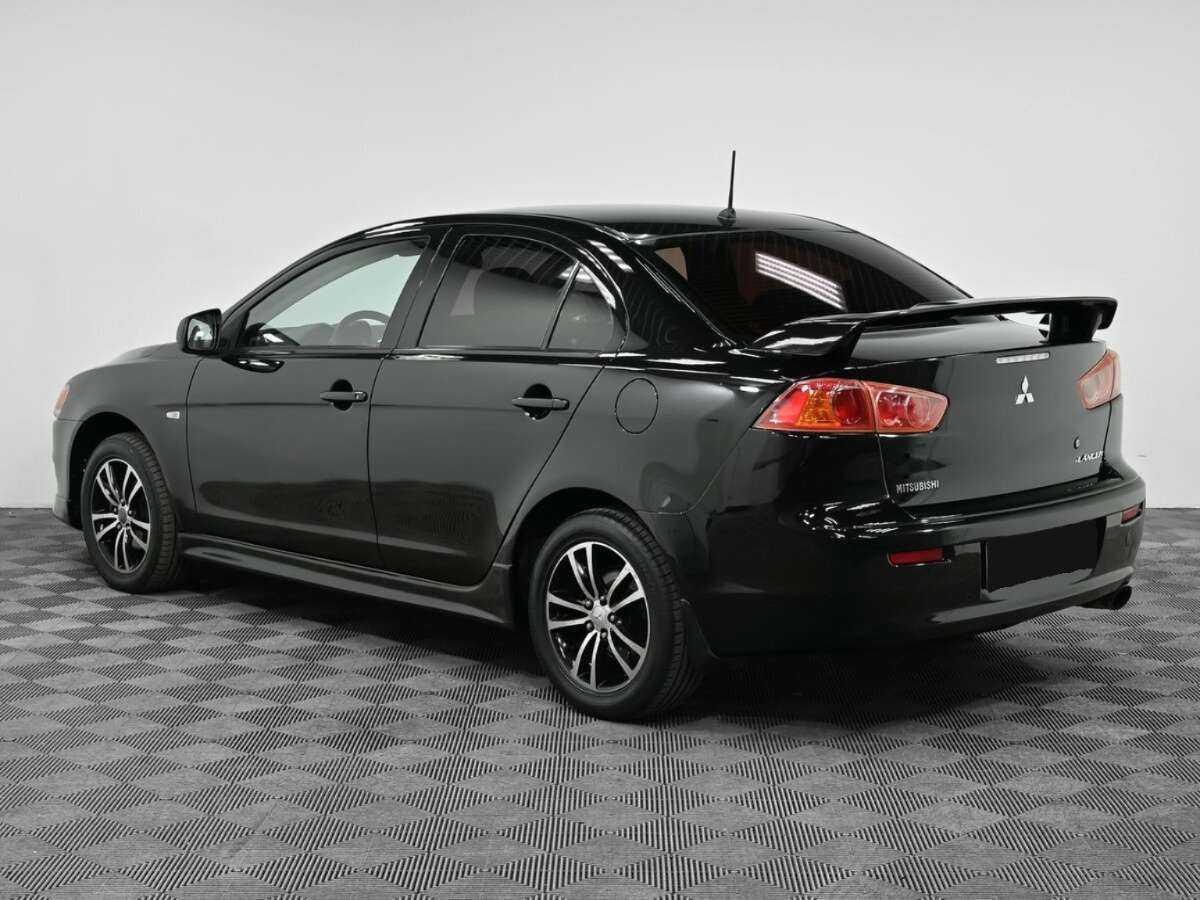 Купить Mitsubishi Lancer с пробегом. Фото: #3
