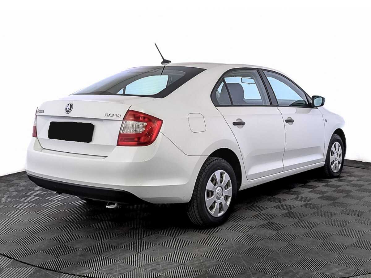 Купить Skoda Rapid с пробегом. Фото: #4