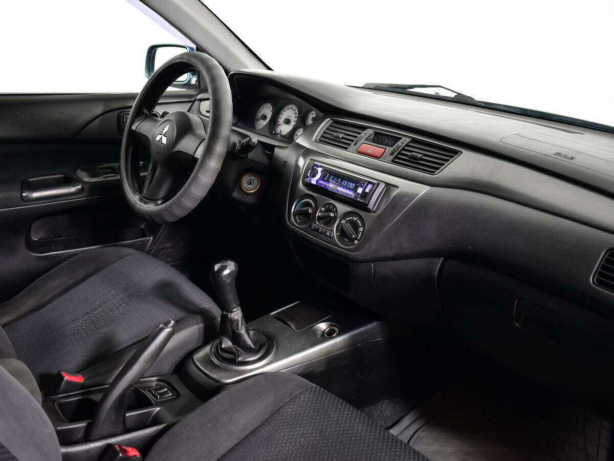 Купить Mitsubishi Lancer с пробегом. Фото: #8