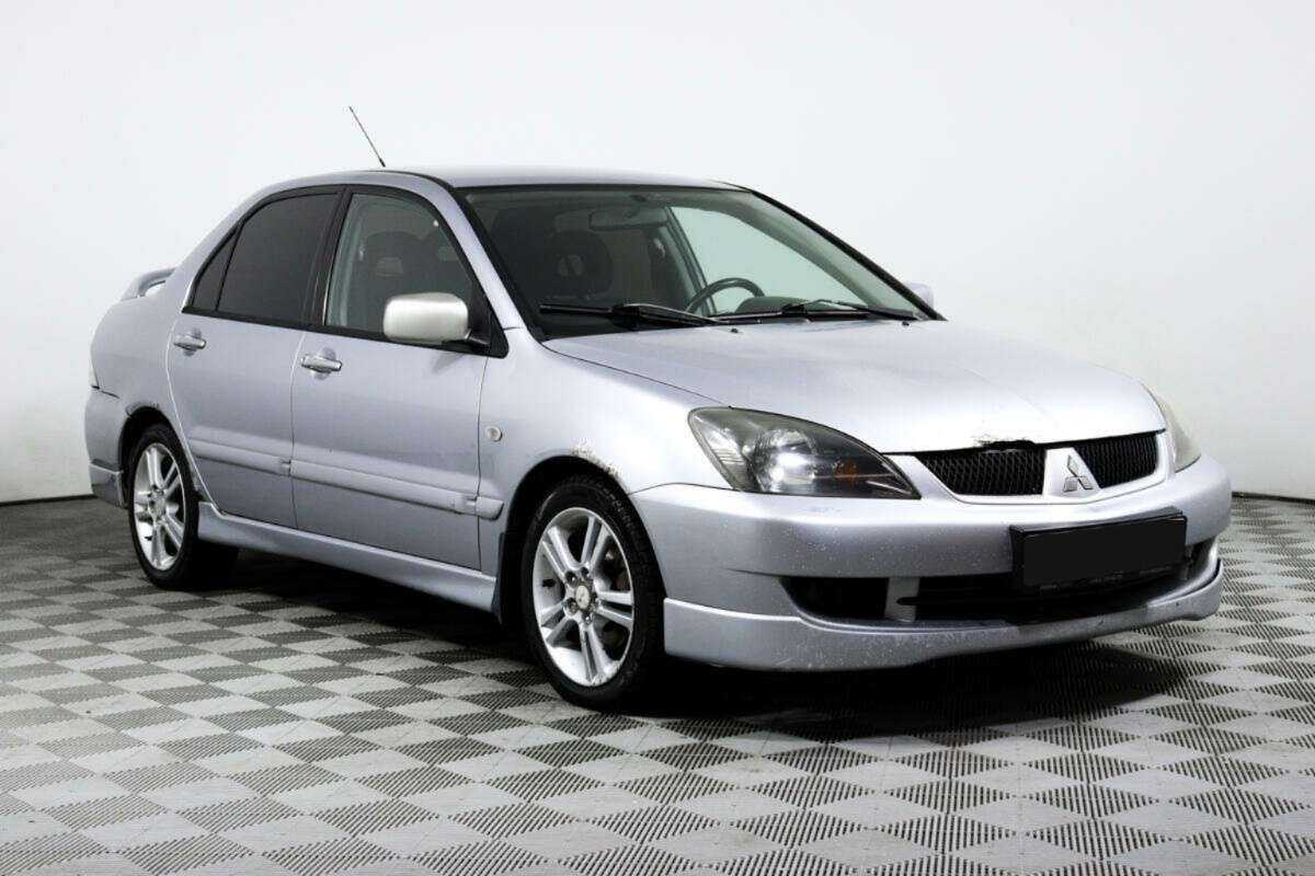Купить Mitsubishi Lancer с пробегом. Фото: #2