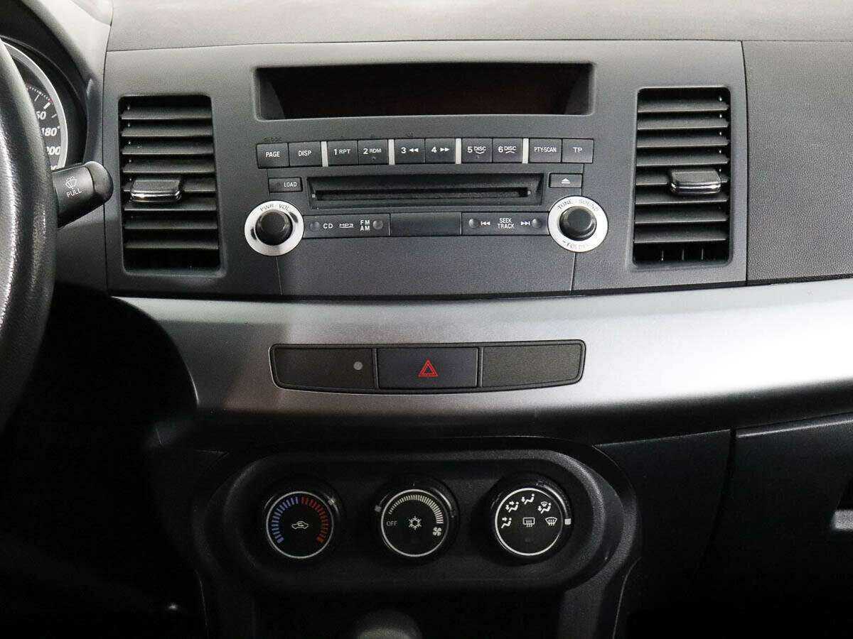 Купить Mitsubishi Lancer с пробегом. Фото: #9