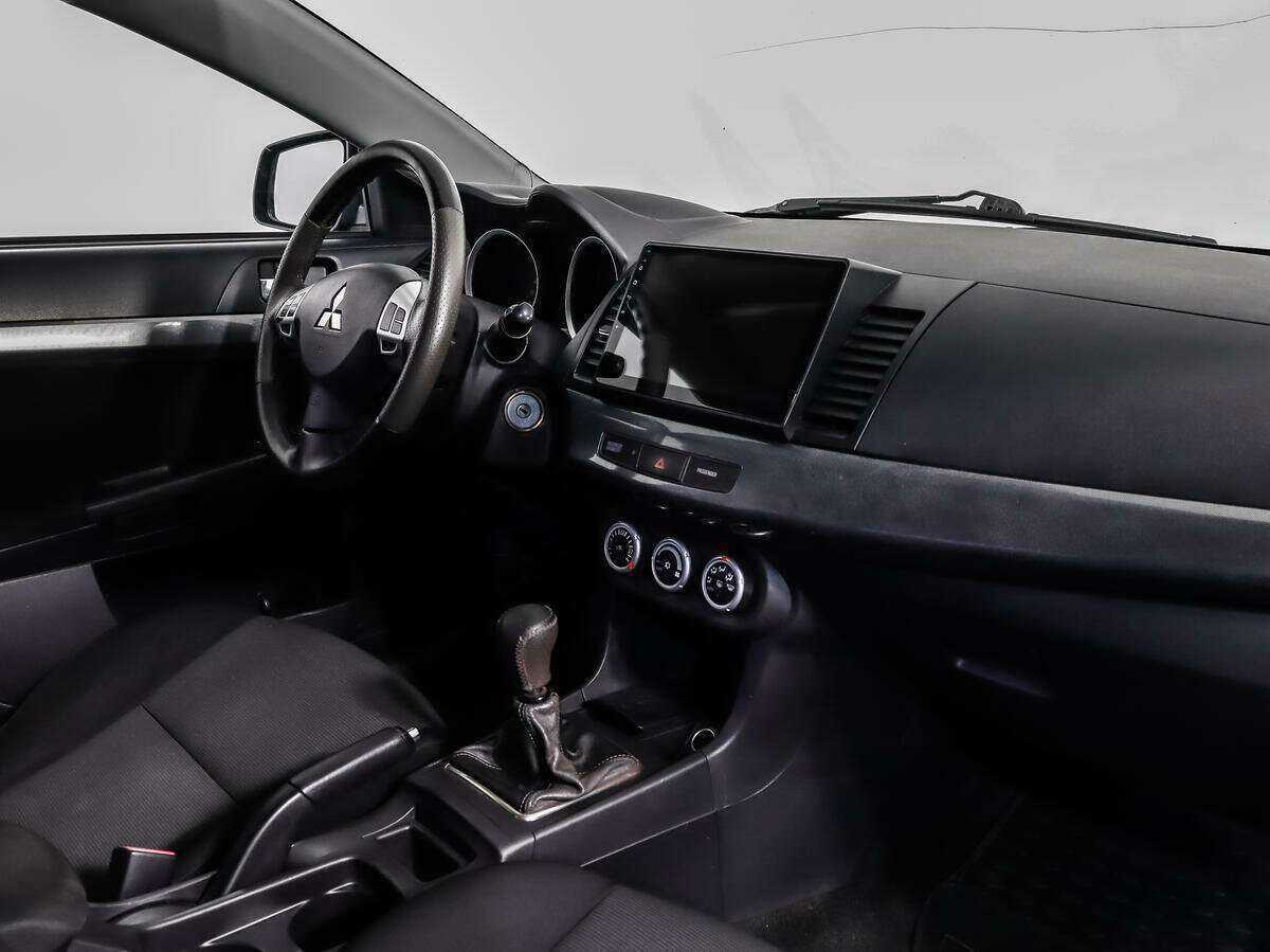 Купить Mitsubishi Lancer с пробегом. Фото: #10