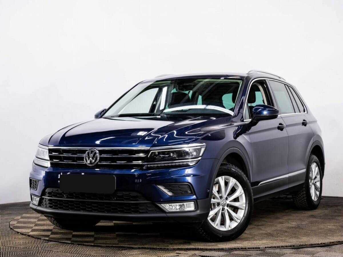 Купить Volkswagen Tiguan с пробегом. Посмотреть фото