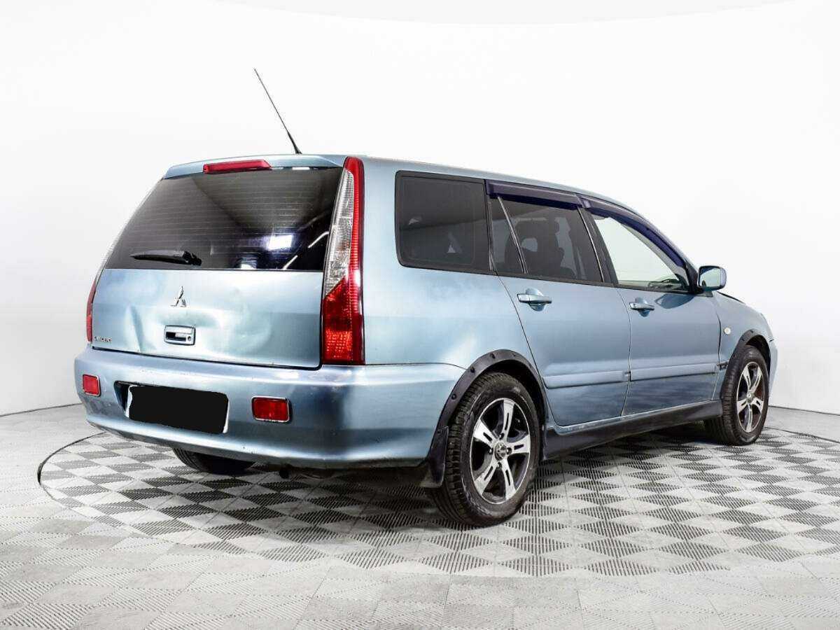 Купить Mitsubishi Lancer с пробегом. Фото: #4