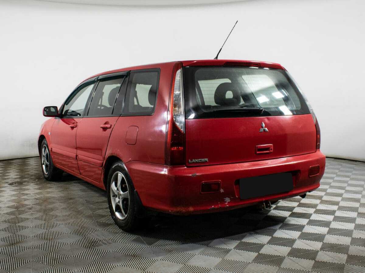 Купить Mitsubishi Lancer с пробегом. Фото: #6