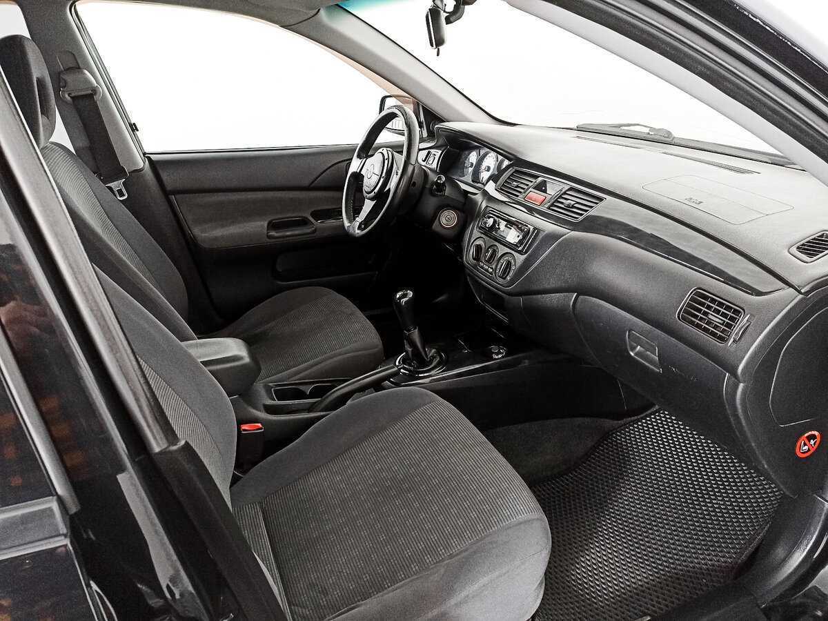 Купить Mitsubishi Lancer с пробегом. Фото: #10