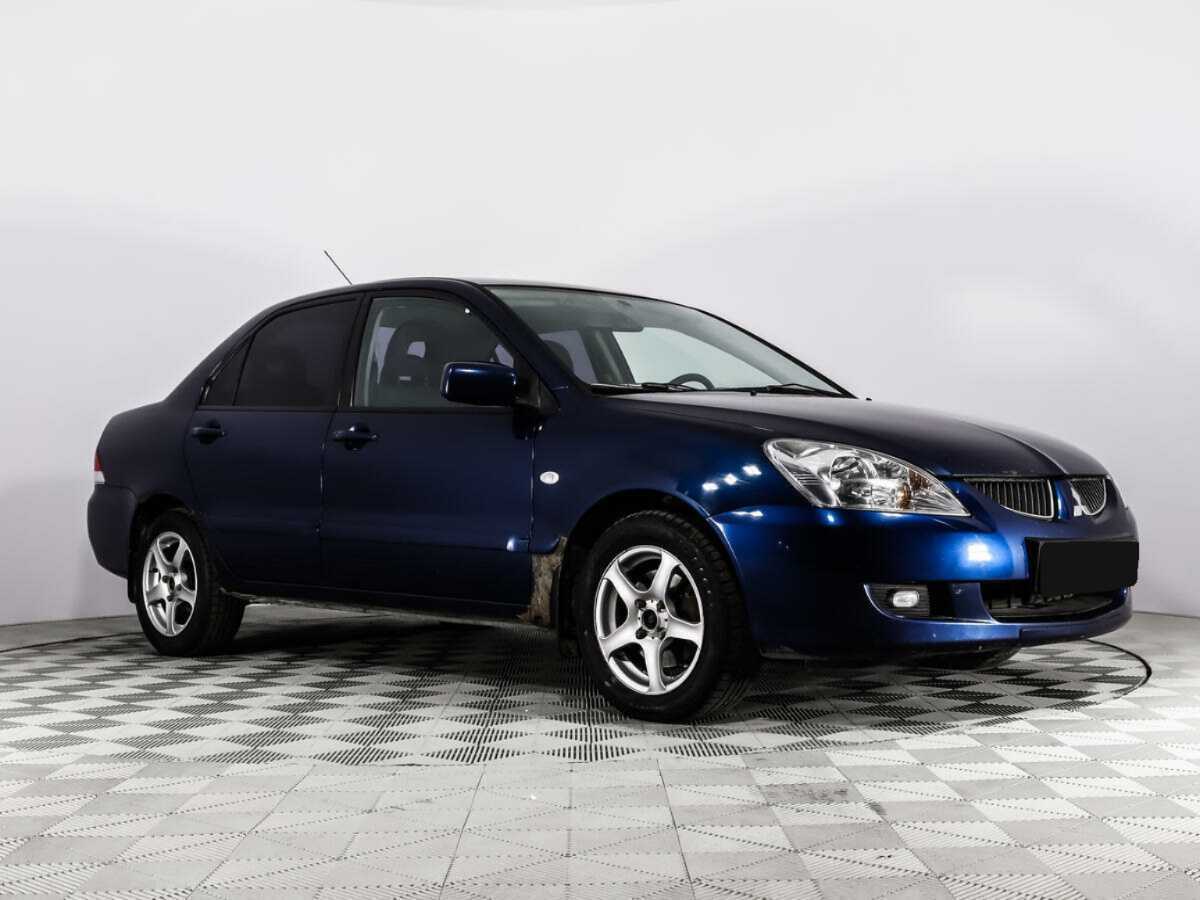 Купить Mitsubishi Lancer с пробегом. Фото: #2