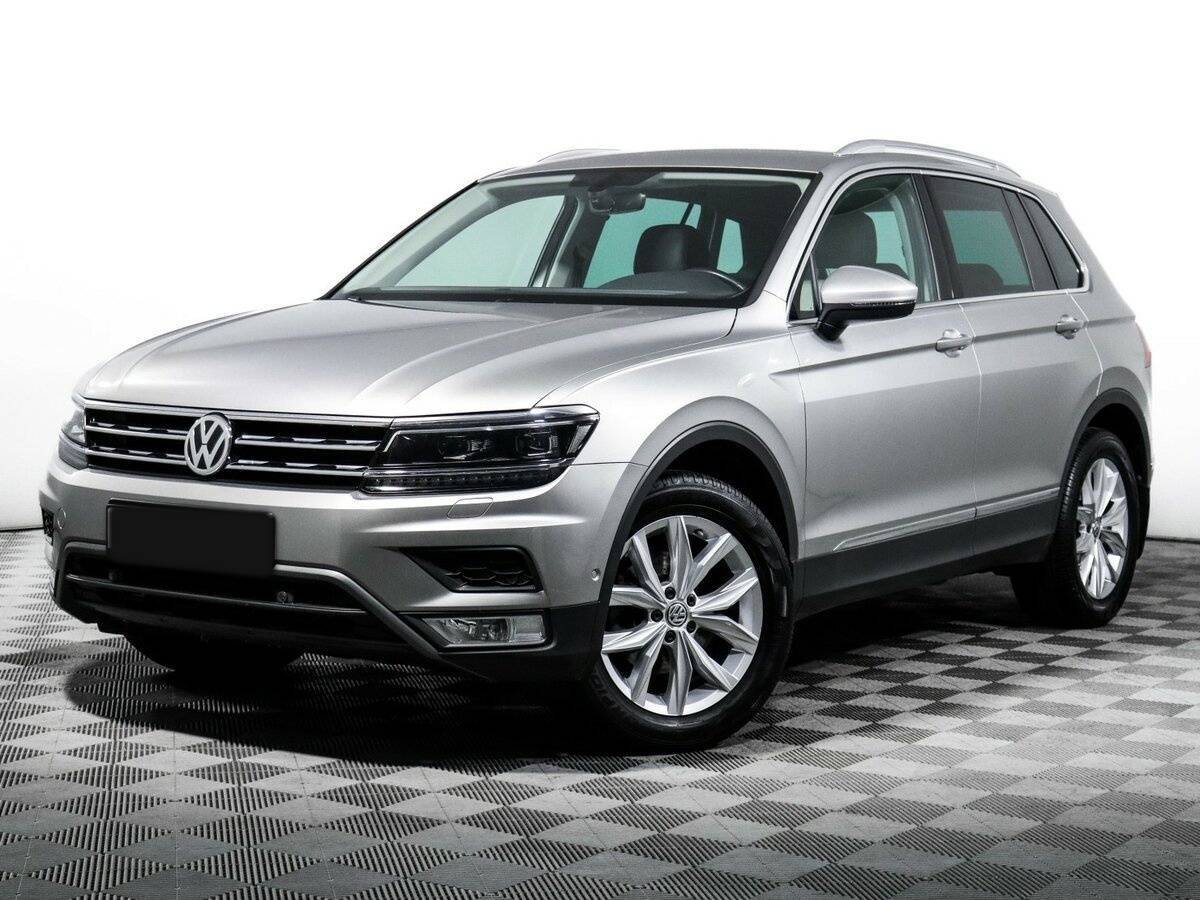 Купить Volkswagen Tiguan с пробегом. Посмотреть фото