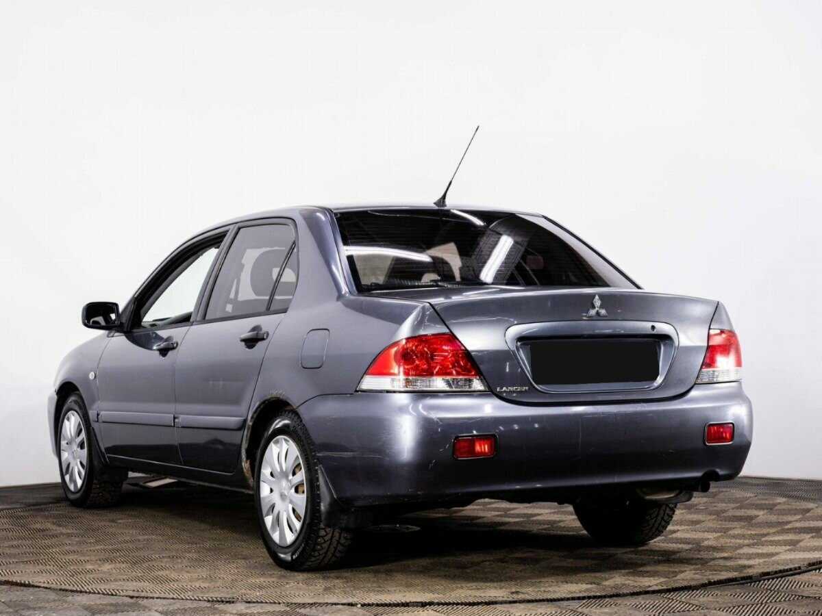 Купить Mitsubishi Lancer с пробегом. Фото: #3